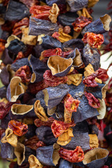 Dry eggplant and dry bell chili hanging on sale at shop
