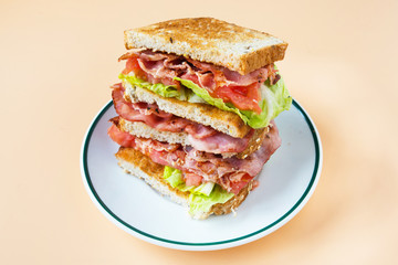 A BLT is a type of sandwich, named for the initials of its primary ingredients, bacon, lettuce and tomato