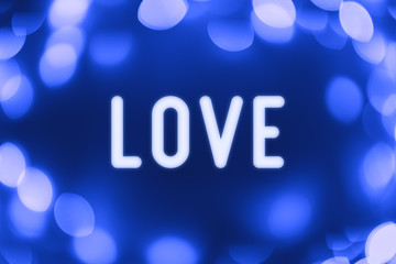 Love - word on a blue background