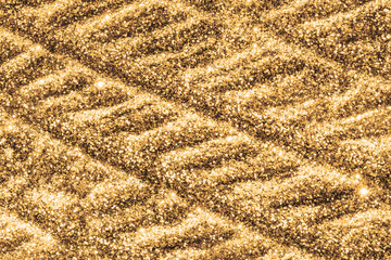 Gleaming bronze and gold background. Gold brown sequins