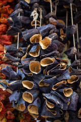 Fototapeta premium Dry eggplant and dry bell chili hanging on sale at shop