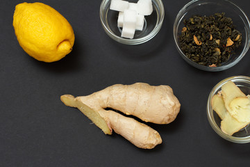 Health remedy foods for cold and flu relief on a black background.