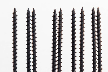 Several tips from wood screws on a white background