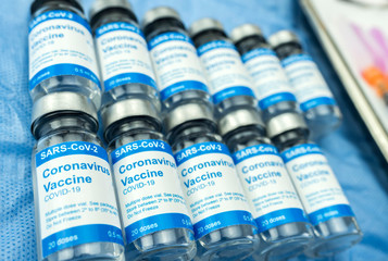 Coronavirus covid-19 experimental vaccine in a laboratory, conceptual image