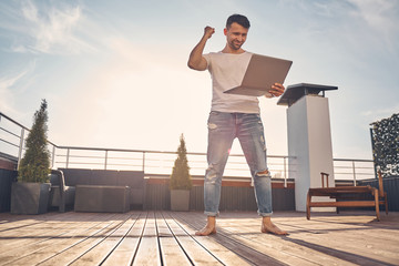 Caucasian brunette male enjoying happy moments in life