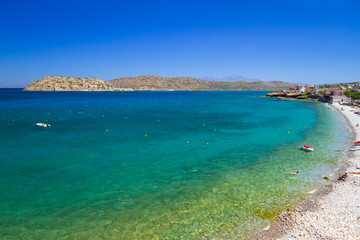 Turquise water of Mirabello bay at the coastline of Crete, Greece