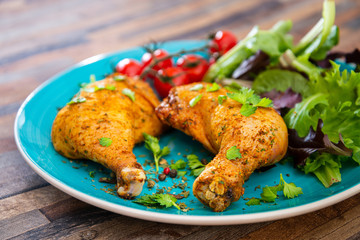 Chicken legs seasoned with curry