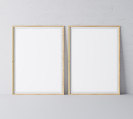 Vertical wooden empty frames in modern design on minimal gray background, A3, A4 size