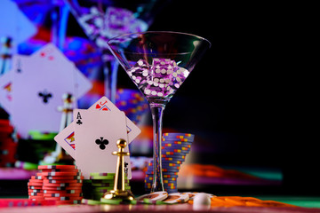 cocktail glass on the casino gambling table