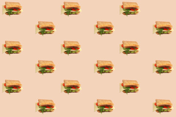 bright pop art, sandwich seamless pattern with cheese, lettuce, tomatoes, cucumbers, sausage, dill and green onions, the concept of a healthy diet, diet, snack at work, at school, student fast food