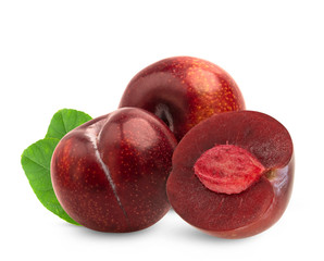 red cherry plum with green leaves isolated on white background