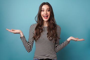 Image of joyful caucasian woman smiling and holding copyspace