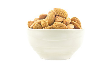 Delicious almonds in a bright, beautiful cup