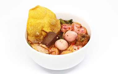 Seafood noodle with tofu and fish ball red sauce, Thai Food,  noodle isolate on white background