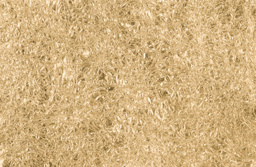 Gold wrinkled paper texture abstract background