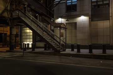 Stairwell leading to train platform in the loop of downtown Chicago at night