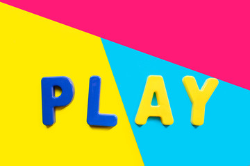 play the word. word on a bright background. Board games, self-isolation in the family circle.