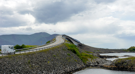 The famous curved bridge construction at the national atlantic ocean road in Molde, Norway. Design, holiday and architecture concept.