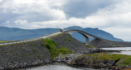 The famous curved bridge construction at the national atlantic ocean road in Molde, Norway. Design, holiday and architecture concept.