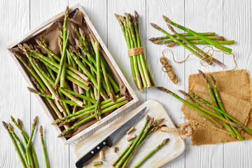 fresh green asparagus on a wooden table