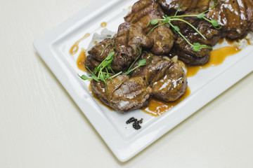 a restaurant dish prepared by a chef for special occasions: weddings, parties, birthdays and just a good dinner. Meat with sauce.