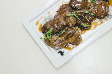 a restaurant dish prepared by a chef for special occasions: weddings, parties, birthdays and just a good dinner. Meat with sauce.
