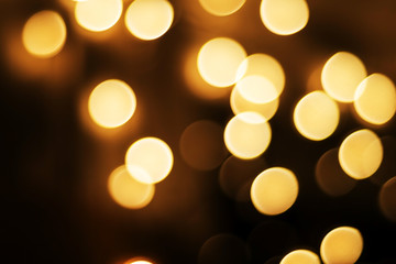 Yellow Christmas Background of round light bulbs With bokeh