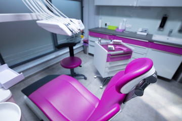 Modern dental practice. Dental chair and other accessories used by dentists.