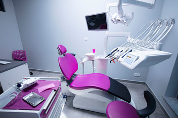 Modern dental practice. Dental chair and other accessories used by dentists.