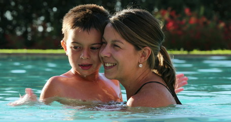 Mother and child at the swimming pool together