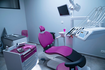 Modern dental practice. Dental chair and other accessories used by dentists.