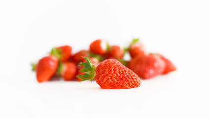 fresh strawberries bright red new crop on a white background