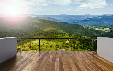 Luxury terrace in the mounting house. Balcony view of mountains. Background with beautiful landscape. Sunny Day. Terrace with a beautiful view. - obrazy, fototapety, plakaty