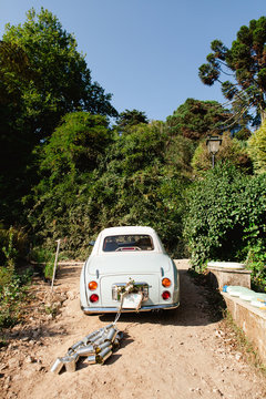 Wedding car driving away.