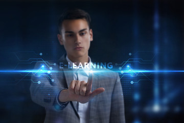 Business, Technology, Internet and network concept. Young businessman working on a virtual screen of the future and sees the inscription: E-learning