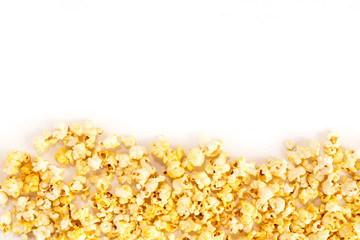 Sweet popcorn on a white background. Flat top view. Copyspace for text.