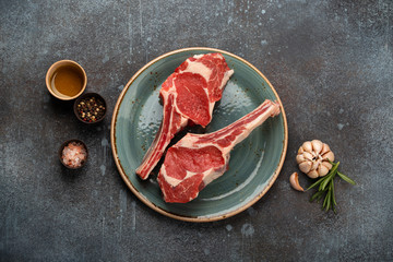 Raw marbled meat steaks