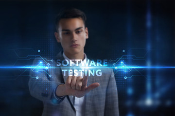 Business, Technology, Internet and network concept. Young businessman working on a virtual screen of the future and sees the inscription: Software testing