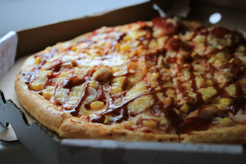 Pizza in a paper box