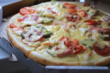 Pizza in a paper box