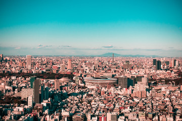 Beautiful landscape of Tokyo, skyscrapers under blue sky.