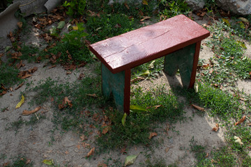 Old red homemade stool