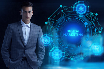 Business, Technology, Internet and network concept. Young businessman working on a virtual screen of the future and sees the inscription: Digital Marketing