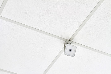 White webcam on the ceiling