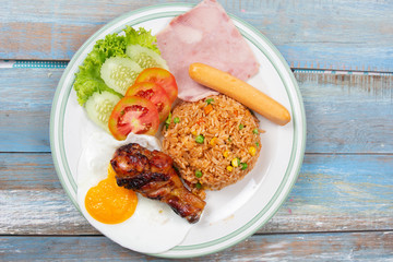Fried rice Thai Style Served Grilled Chicken, Saucesage ,Ham and Fried Egg