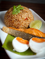 Chili paste fried rice with salmon and salty egg.