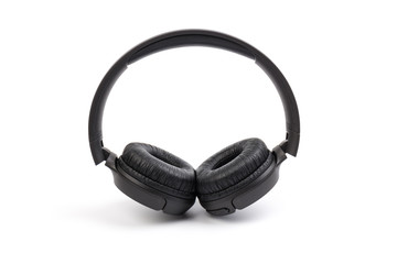 Black wireless headphones on white background.  Advanced acoustic stereo sound system