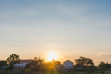 Obraz na płótnie Canvas sunset over the village