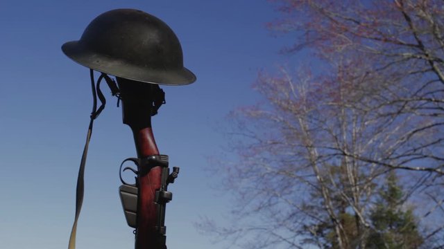World war era rifle and helmet