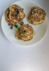 Pancakes on a white plate